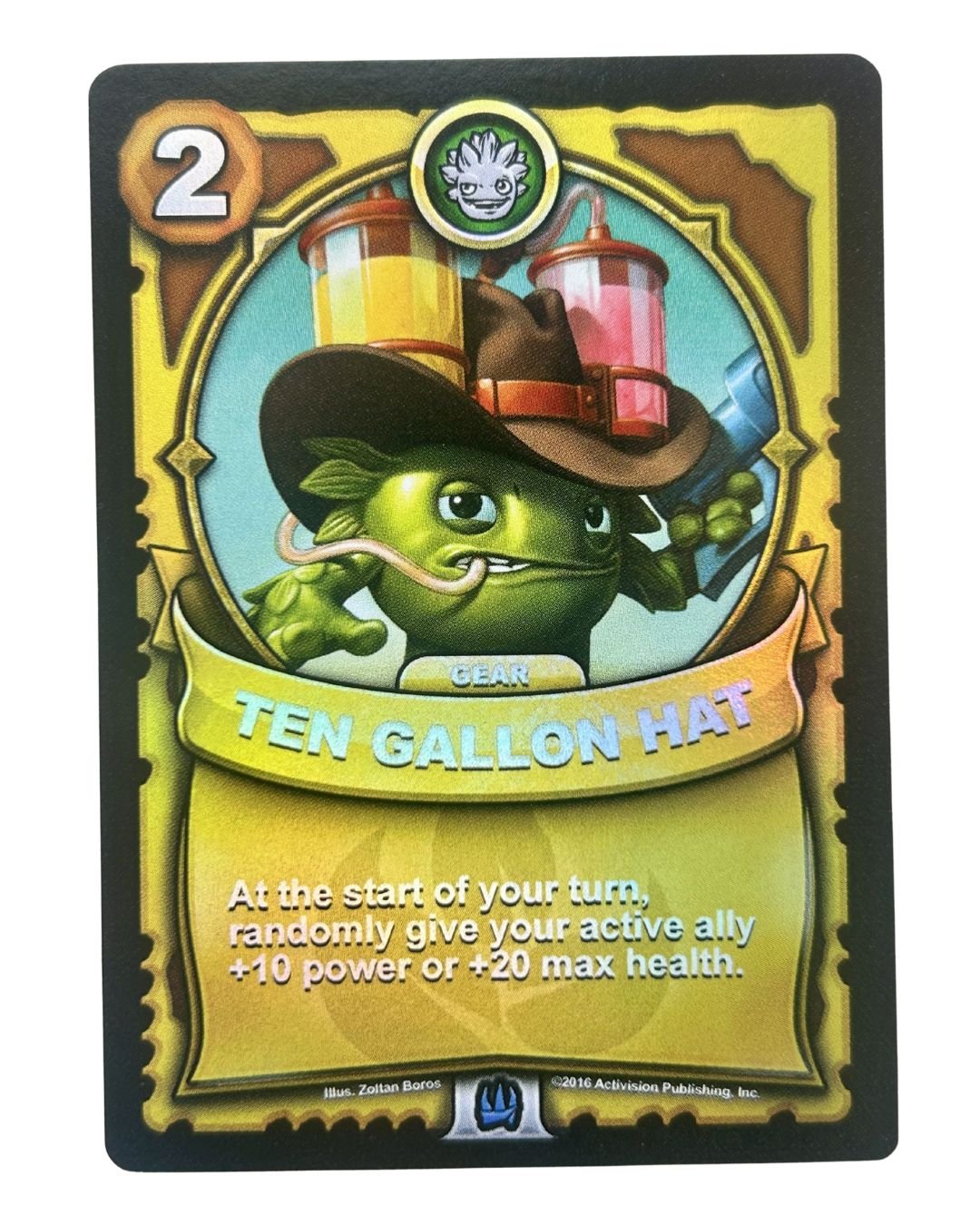 Ten Gallon Hat (Battlecast) (Gold Foil) - Nick Nack's Full Frontal Attack