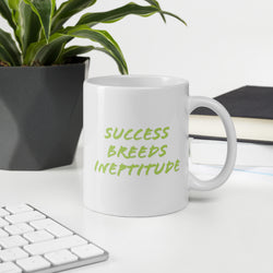 "Success Breeds Ineptitude" White glossy mug