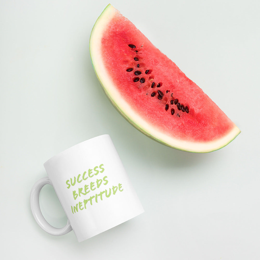 "Success Breeds Ineptitude" White glossy mug